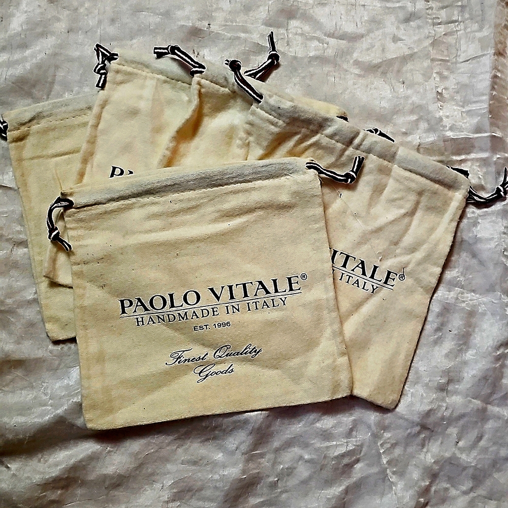 Paolo Vitale Duster Bags. Creme colored. Brand new never used.